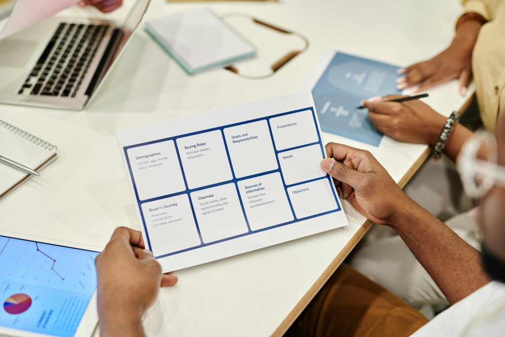 Business professionals reviewing documents during a collaborative office meeting. Perfect for business presentations.